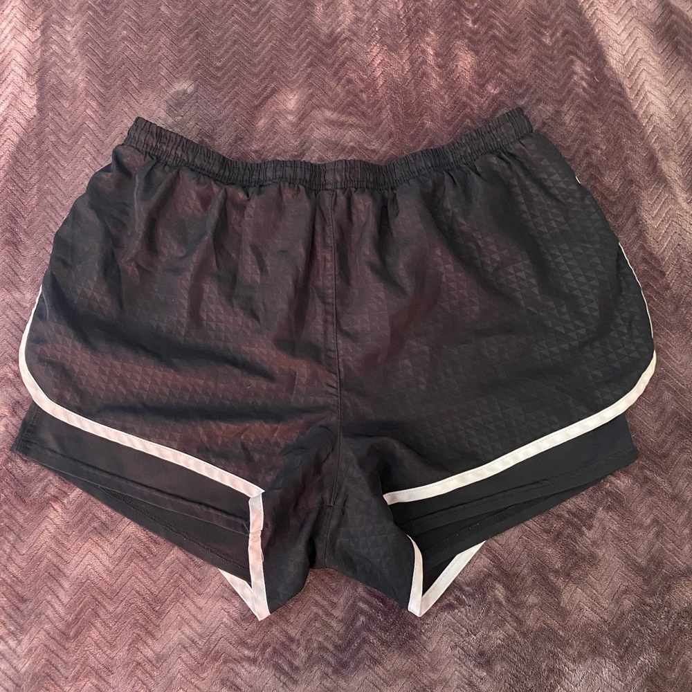 Athletic shorts with compression built in